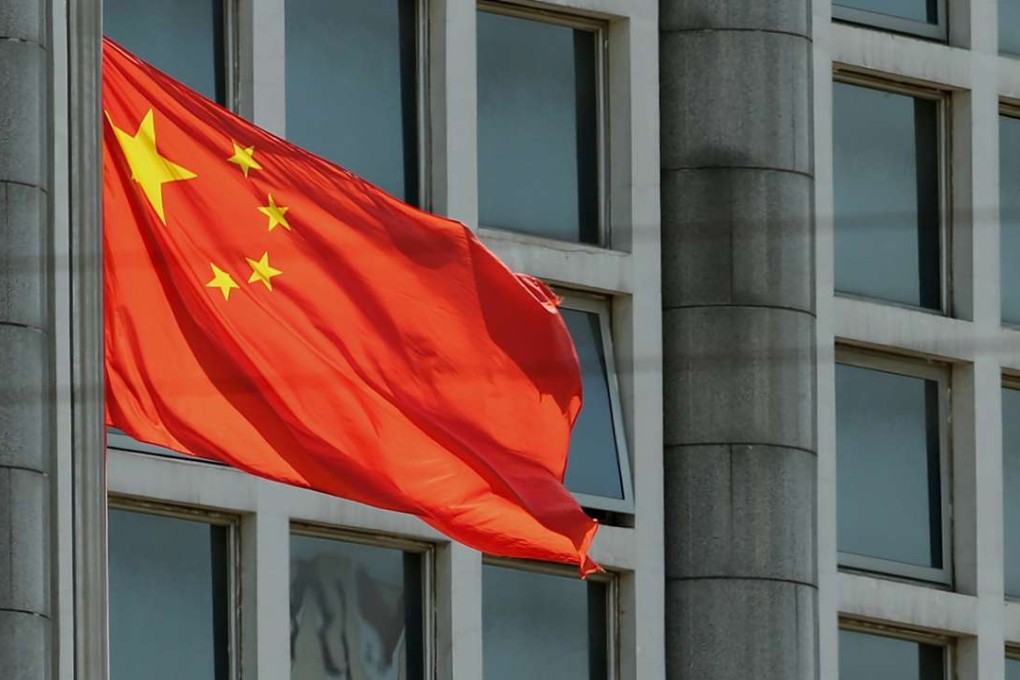 The Chinese national flag is seen on a flagpole in Beijing. Photo: AFP