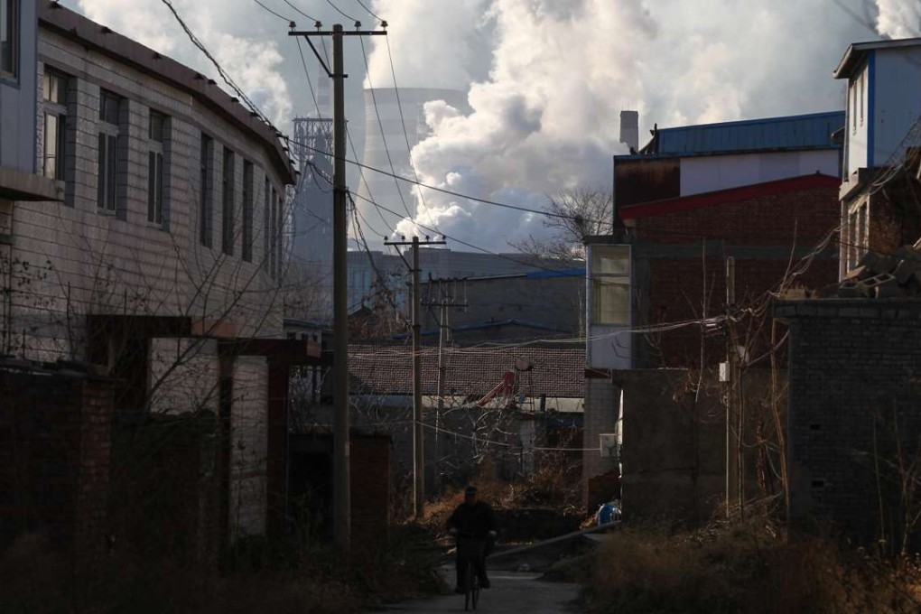 A man rides a bicycle in Songting village in Qianan, Hebei province, early this month. Photo: Simon Song