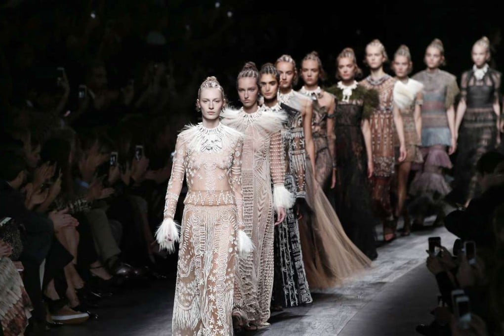 Models present creations by Valentino during the 2016 spring-summer ready-to-wear collection fashion show. Photo: AFP