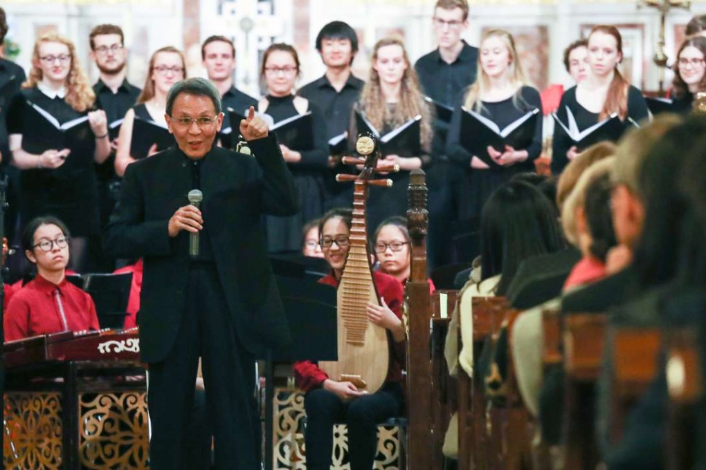 Gordon Siu leads the youngsters during the performance with the Cambridge University choir in St John's Cathedral. Photos: Nora Tam