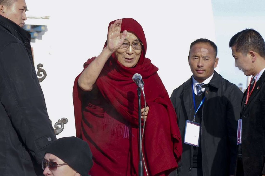 The Dalai Lama (centre) pictured during his trip to Mongolia last month. Photo: Associated Press