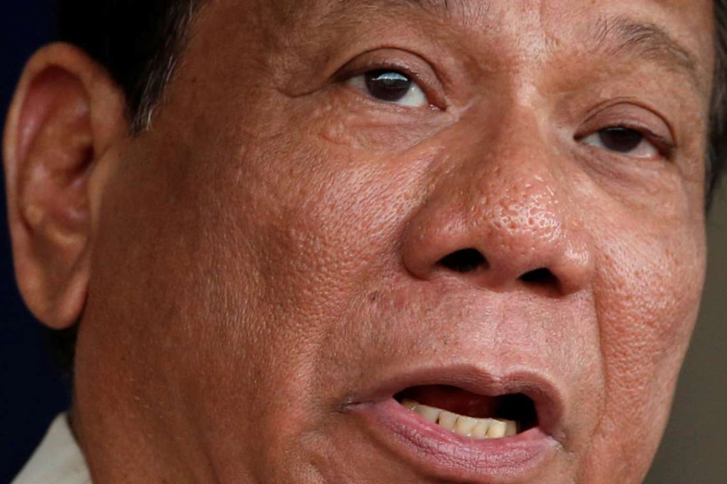 Philippine President Rodrigo Duterte speaks to soldiers during the Armed Forces anniversary celebration at Camp Aguinaldo in Quezon city, Metro Manila, Philippines December 21, 2016. REUTERS/Erik De Castro