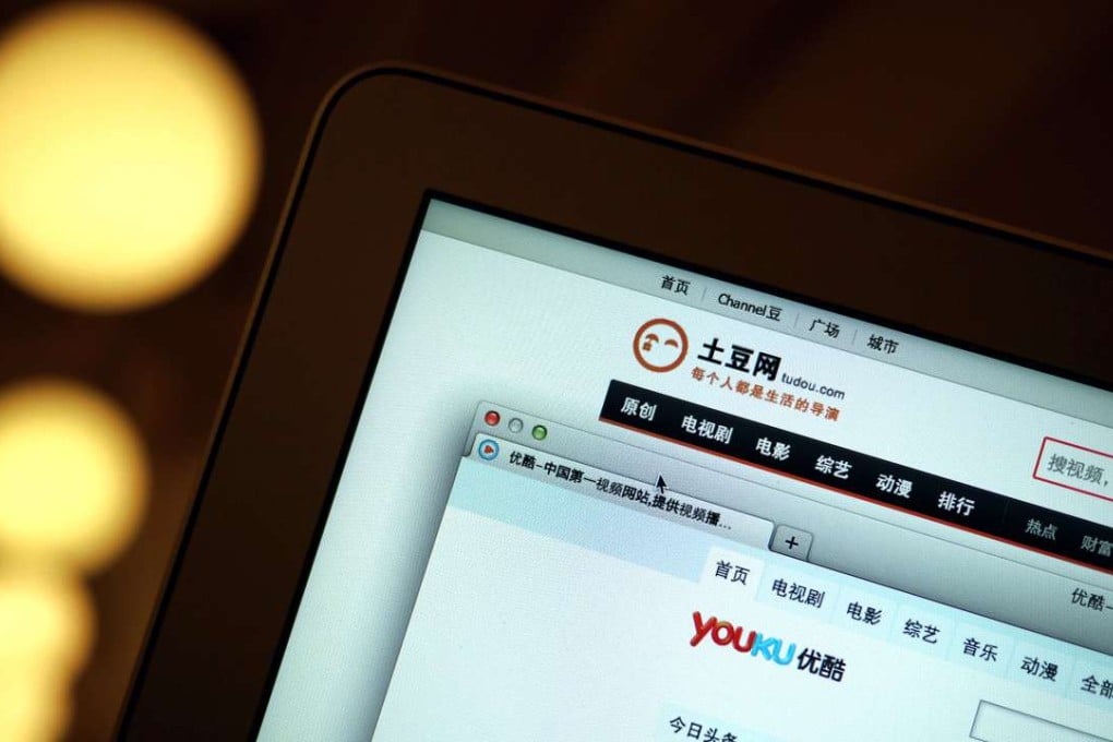 A picture to display two internet online vedio websites Tudou and Youku on a personal computer in Hongkong. Photo: Martin Chan