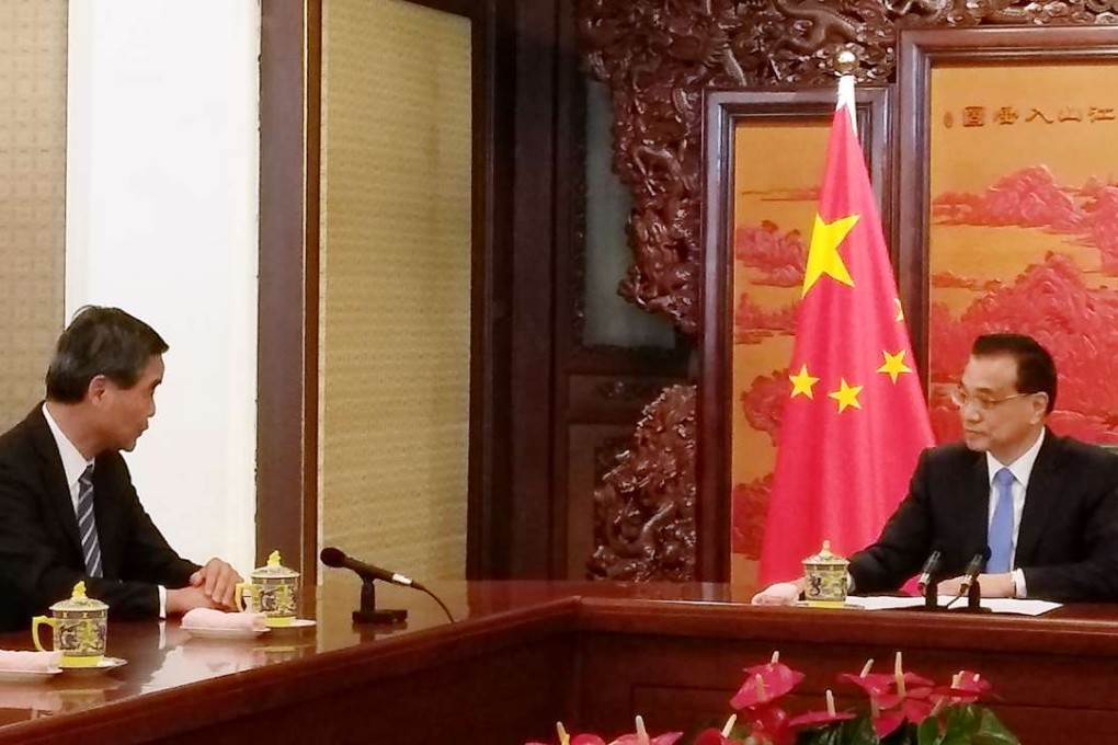Leung Chun-ying tells Premier Li Keqiang that in the past year, Hong Kong “achieved some results” towards developing the economy and improving people’s livelihoods. Photo: SCMP Pictures