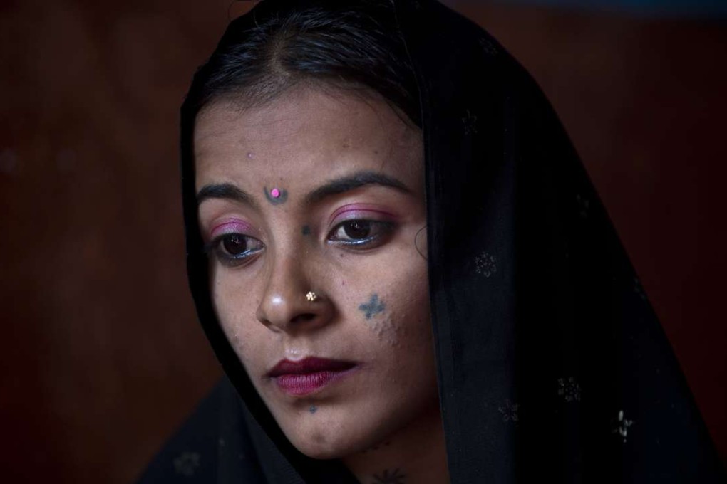 Jeevti sits in her husband's house in Pyaro Lundh, Pakistan. The night Jeevti disappeared, her family slept outside to escape Pakistan's brutal summer heat; in the morning she was gone, snatched by a wealthy landlord to whom her parents owed US$1,000 dollars. Photo: AP