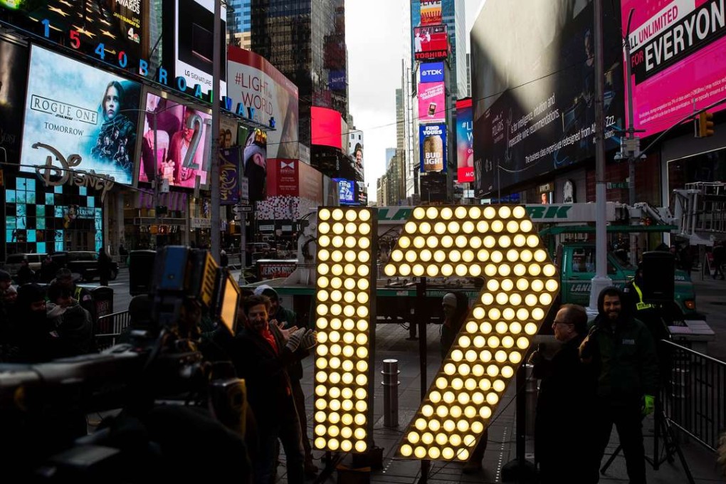 Times Square in New York gets ready for New Year’s Eve celebrations. In 2017, Brexit and Donald Trump’s assumption of the US presidency will bring many more surprises. Photo: AFP