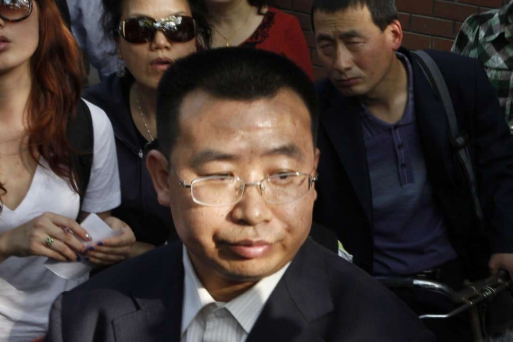 Rights activist Jiang Tianyong in a file photo in 2012. Authorities say he is being held under supervision at a residential location in Zhengzhou in Henan province. Photo: AP