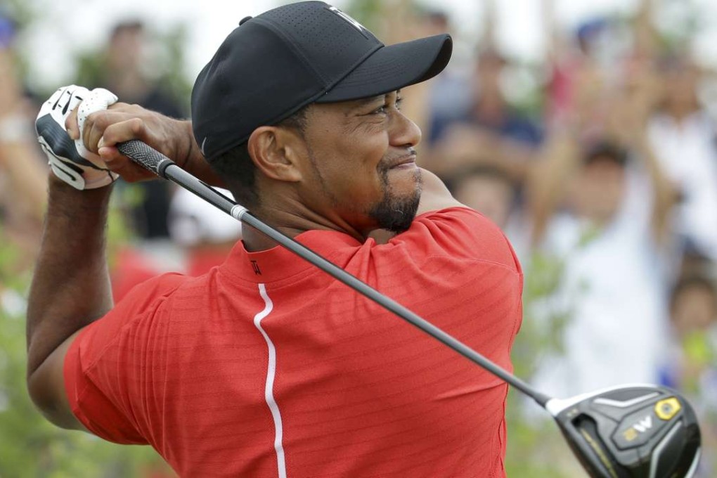 Tiger Woods watches his tee shot during the final round at the Hero World Challenge. Photo: AP
