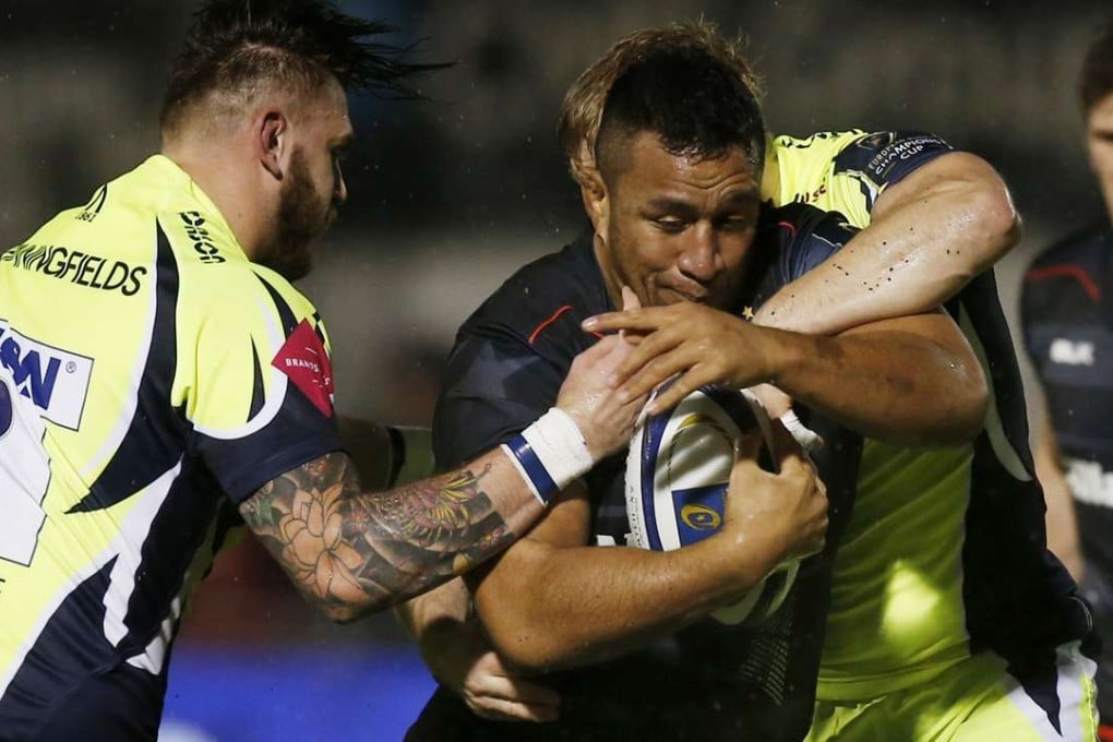 Saracens' Mako Vunipola is tackled by Sale's David Seymour and Laurence Peacre. Photo: Reuters