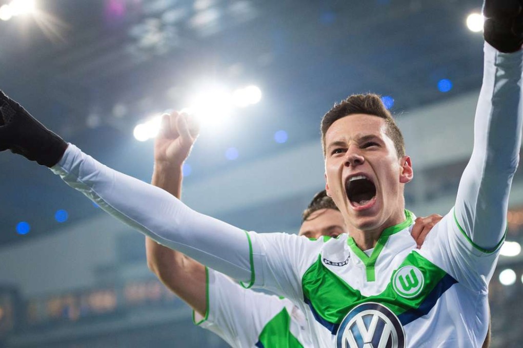 Julian Draxler celebrating after scoring for Wolfsburg against Gent in the Uefa Champions League in February 2016. Photo: EPA