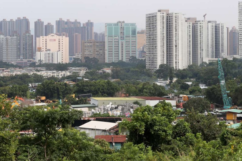 The government development on the Wang Chau site is still expected to evict about 180 families from three villages, even though New Town Development seems to be unable to get their project off the ground. Photo: Edward Wong