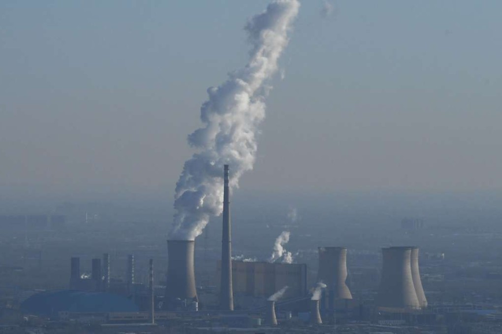 A power plant on the outskirts of Beijing on Friday. China has passed legislation to tax factories, power plants and other pollution emitters for the contaminants they release. Photo: AFP