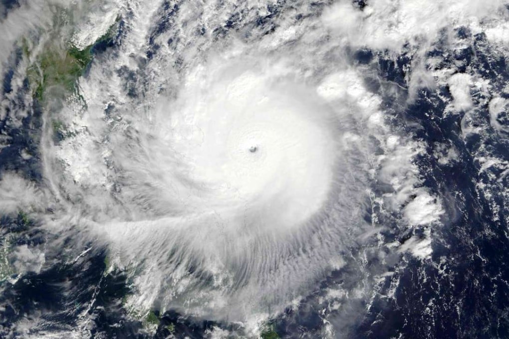 A NASA satellite image shows super Typhoon Nock-ten over the Philippines. Photo: AFP