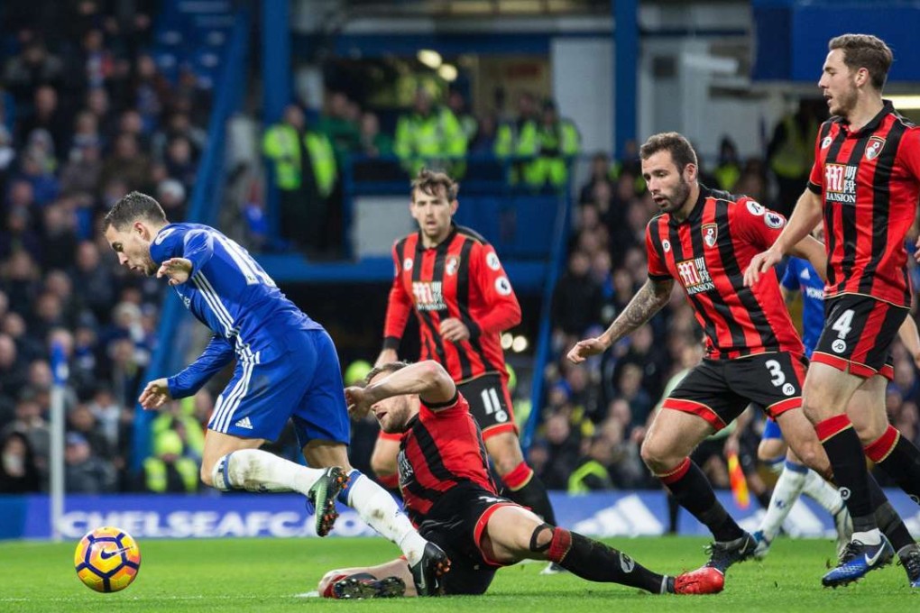 Chelsea's Eden Hazard (L) vies for the ball during the team’s 3-0 win against Bournemouth on December 26. It was one of six EPL games broadcast by LeSports HK to suffer an interruption in coverage. Photo: EPA