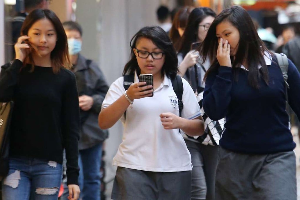 Young students in Causeway Bay on November 23. Hong Kong has yet to develop a central guiding principle for youth development. Photo: David Wong