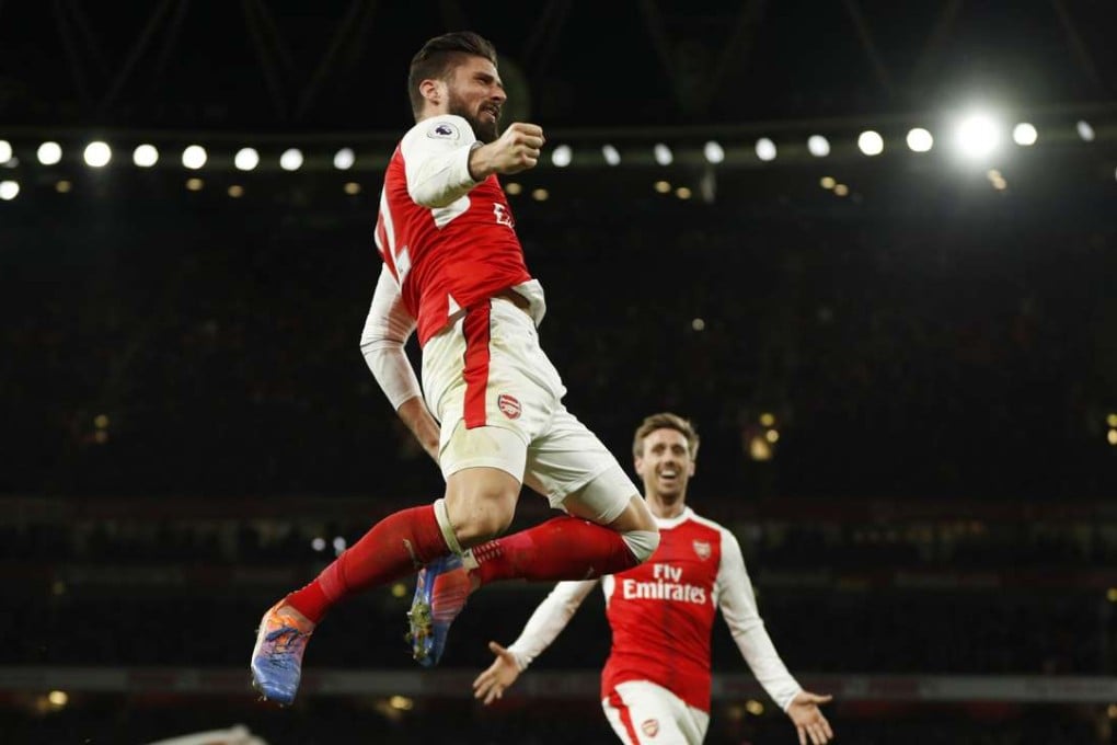 Arsenal's Olivier Giroud celebrates scoring the winning goal against West Brom. Photos: Reuters