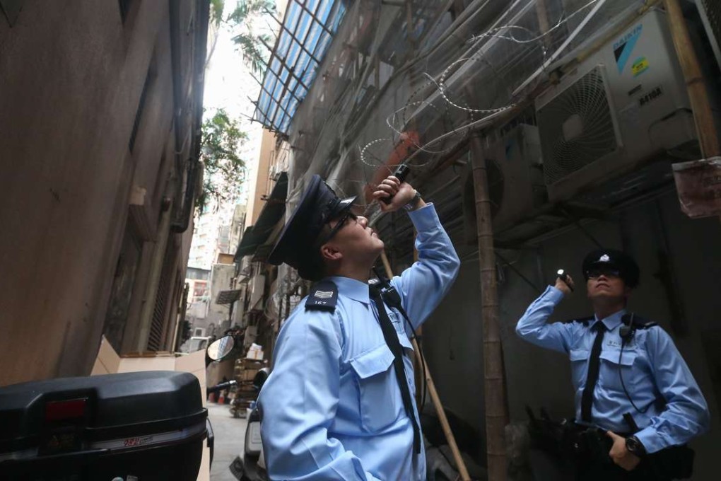 Hong Kong police conducts anti-burglary information event in Sheung Wan. Photo: K. Y. Cheng