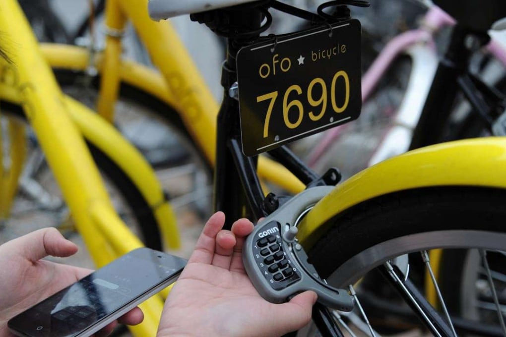 Ofo’s yellow bicycles, offering no-frills service without GPS, can be rented for 1 yuan per hour through the swipe on a smartphone. Photo: ChinaFotoPress