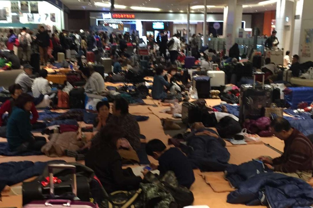 Passengers of delayed flight HX697 wait at New Chitose Airport in Sapporo. Photo: Handout