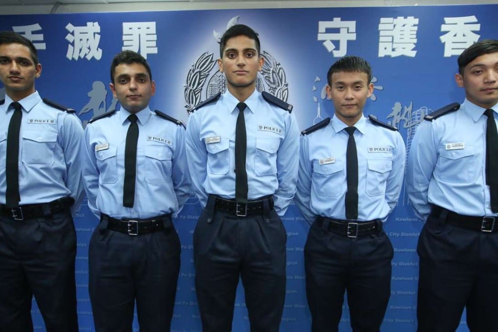 Non-ethnic Chinese police officers (from left) Gimandeep Singh, Gagandeep Singh, Zaffar Ifzal, Niraj Gurung and Dean Jason Olino Escuro. Photos: Edmond So
