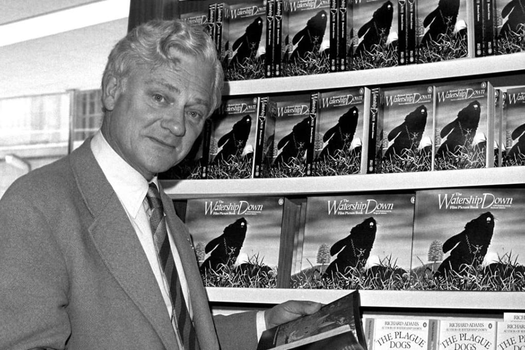 In this 1978 file photo, author Richard Adams poses in front of his book Watership Down, a classic of children's literature. Photo: AP
