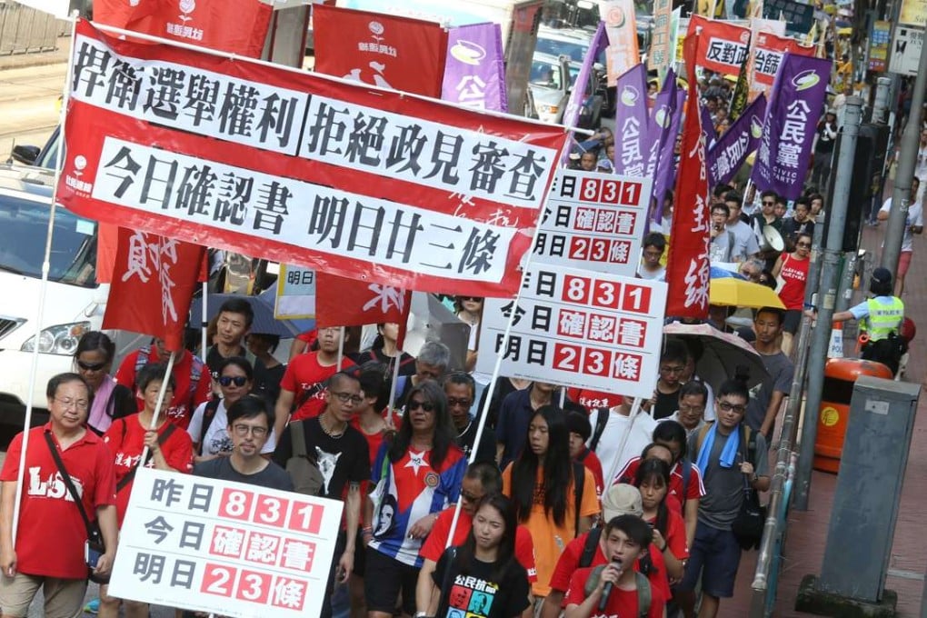 Protesters in an ‘anti-political screening’ march in August organised by the Civil Human Rights Front. Photo: Dickson Lee