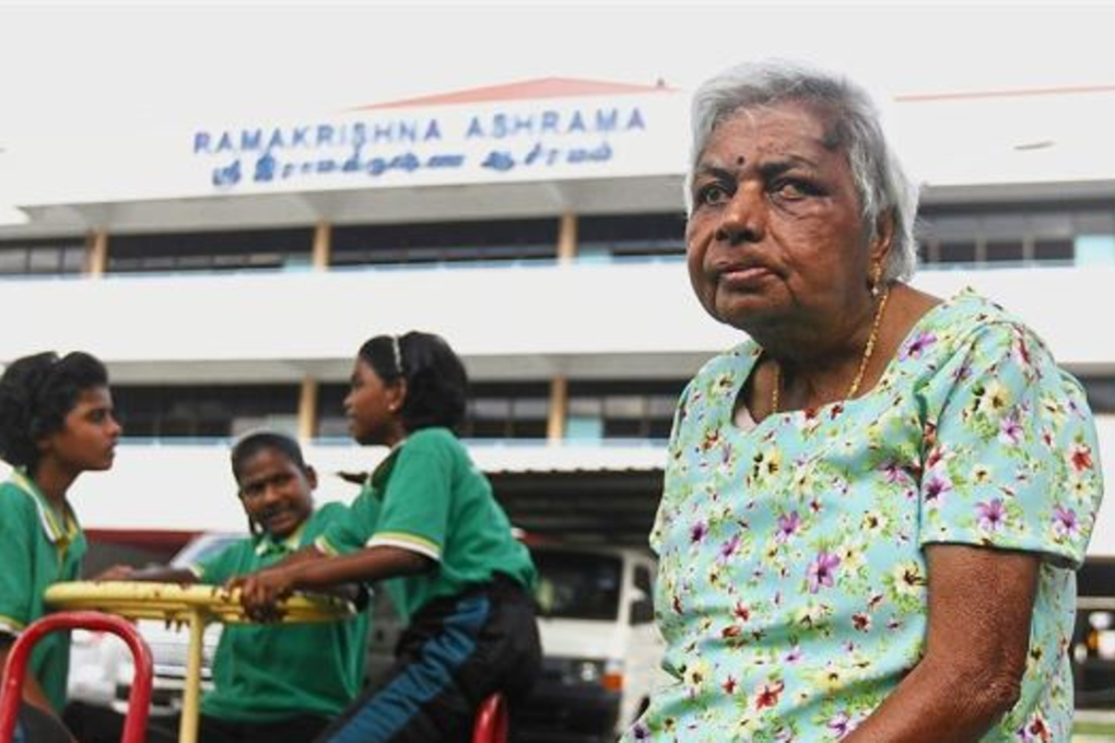 No ordinary life: Kamatchi sitting at the playground at the Ramakrishna Ashrama in Scotland Road in Penang. Photo: Star