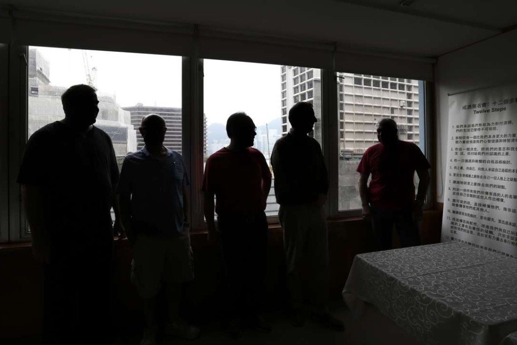 Members of Alcoholics Anonymous Hong Kong, at the Mariners Club, in Tsim Sha Tsui. Picture: Jonathan Wong