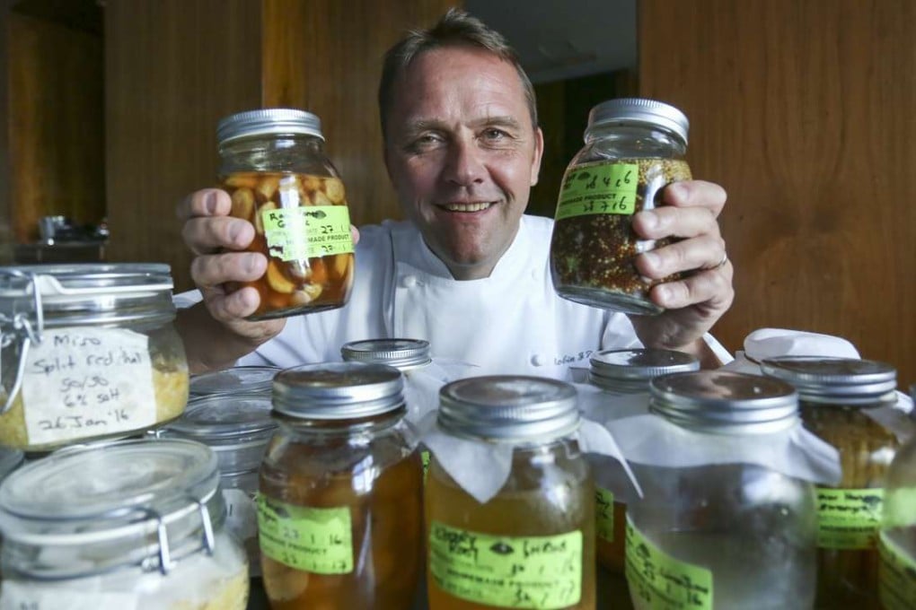 Executive chef Robin Zavou with some of his fermented ingredients at the Mandarin Grill + Bar in Central. Photo: Jonathan Wong