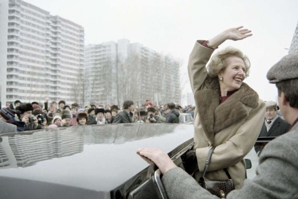 British Prime Minister Margaret Thatcher greets curious Moscovites who gathered to see her on March 29, 1987 in Moscow, during her official visit in USSR. Photo: AFP