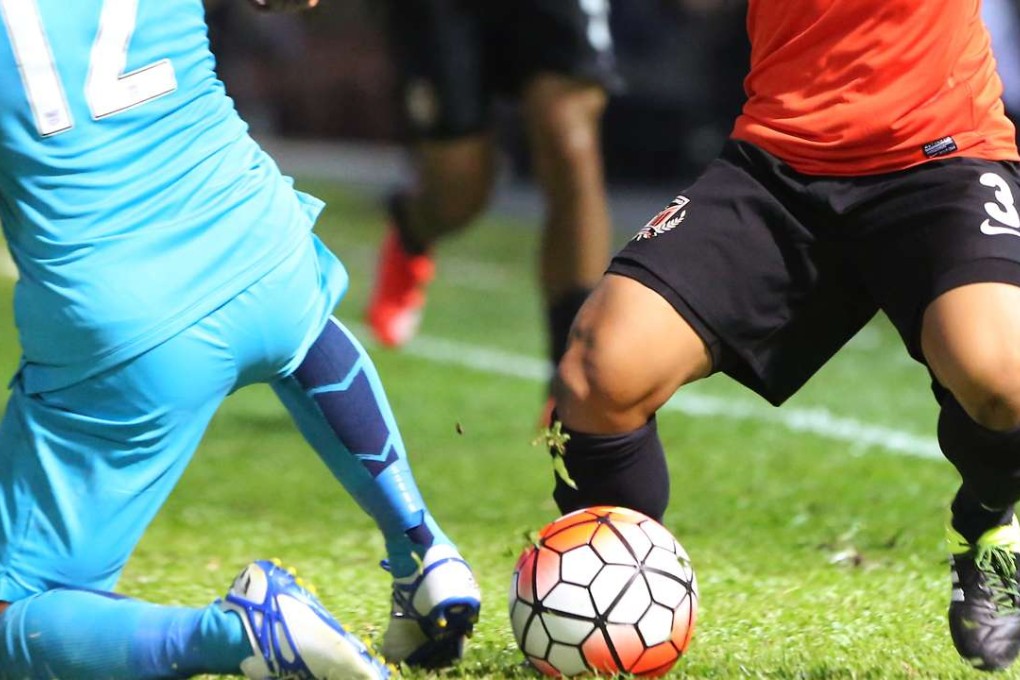 Kitchee (blue shirt) are among the clubs affected by the Fifa ruling. Photo: Edward Wong