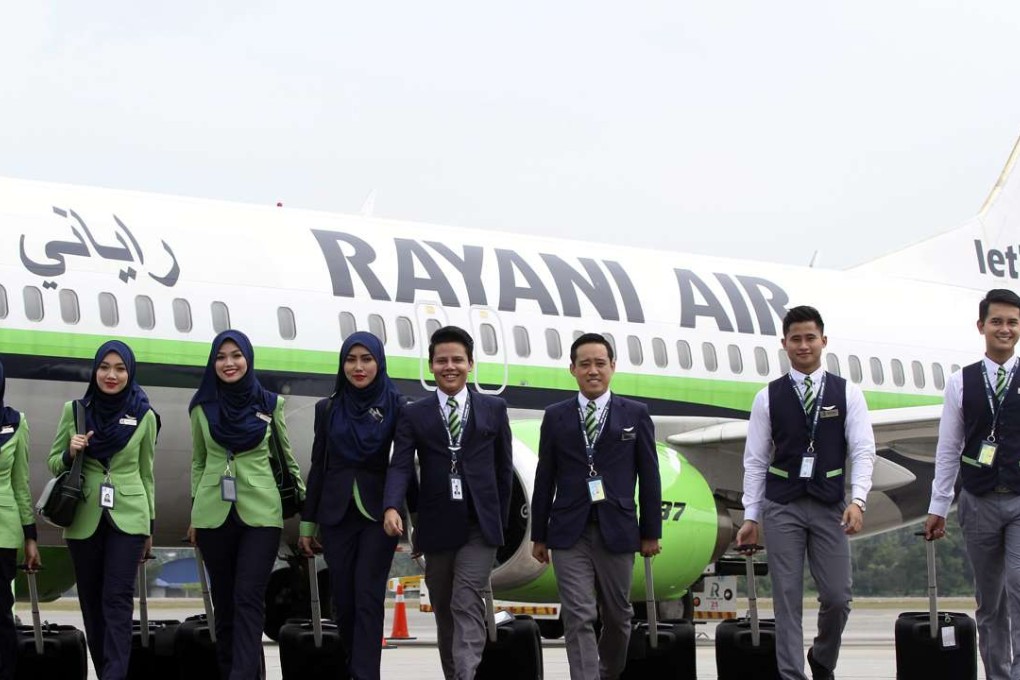 Rayani Air had its air service licence revoked in June following a number of safety regulation violations, although the Malaysian Aviation Commission says it can apply for a new licence. Photo: EPA/AFIQ RAZALI MALAYSIA OUT