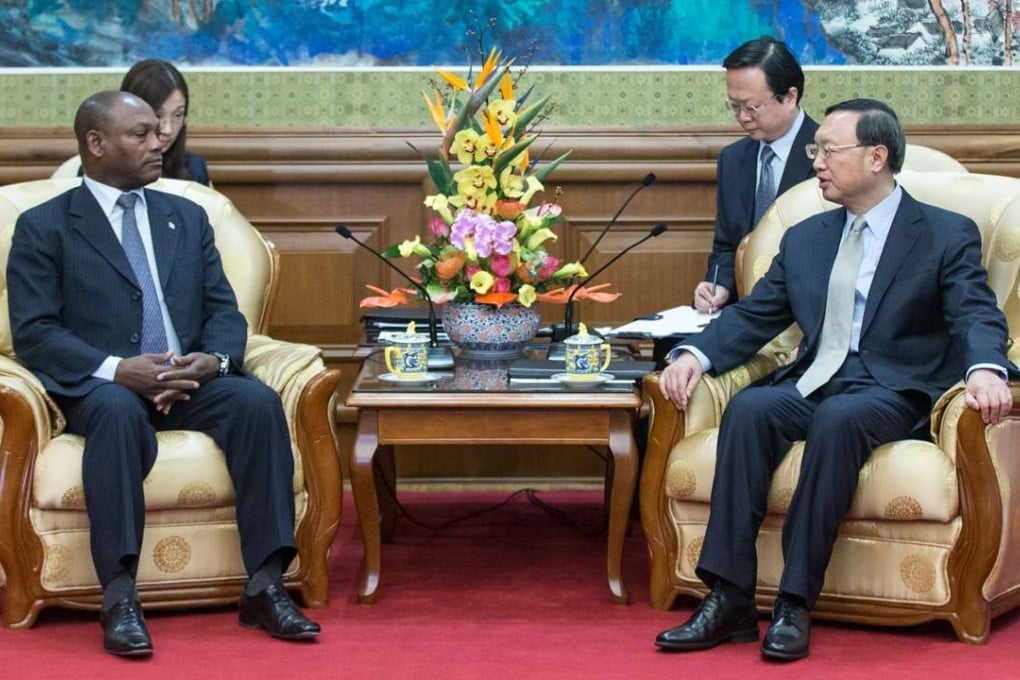 Chinese State Councillor Yang Jiechi meets Urbino Botelho, foreign minister of Sao Tome and Principe, in Beijing. Photo: Xinhua