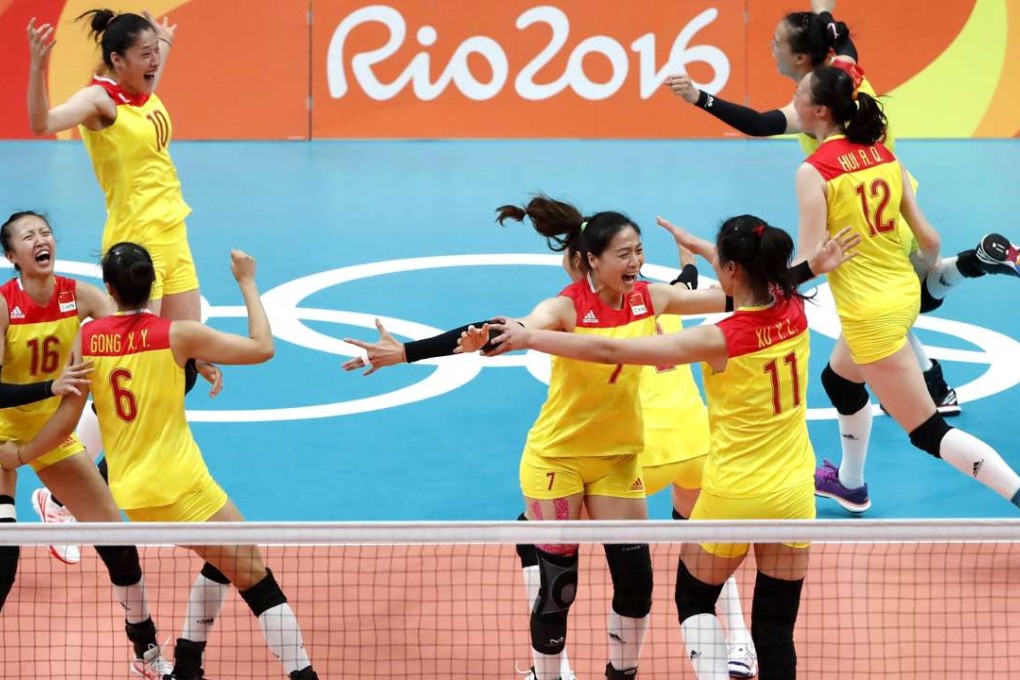China's women volleyball players celebrate their gold medal wing against Serbia at the 2016 Rio Olympics. Photo: Xinhua