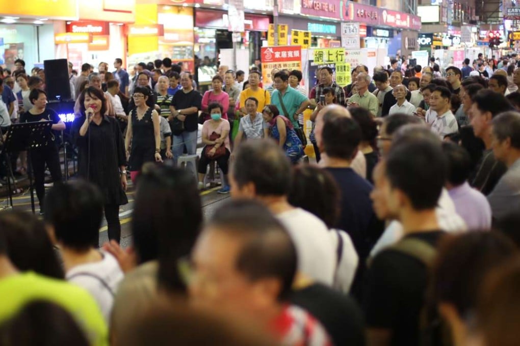 A public performance in 2015 in a rare pedestrian zone in heaving Mong Kok. Photo: Sam Tsang