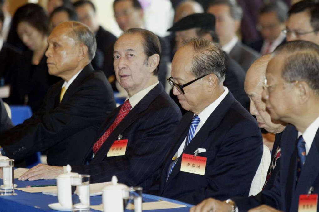 From left, Hong Kong tycoons Henry Fok Ying-tung, Stanley Ho Hung-sun and Li Ka-shing during a meeting in Beijing in September 2003. The old tycoons have lost their influence in the capital. Photo: Mark Ralston