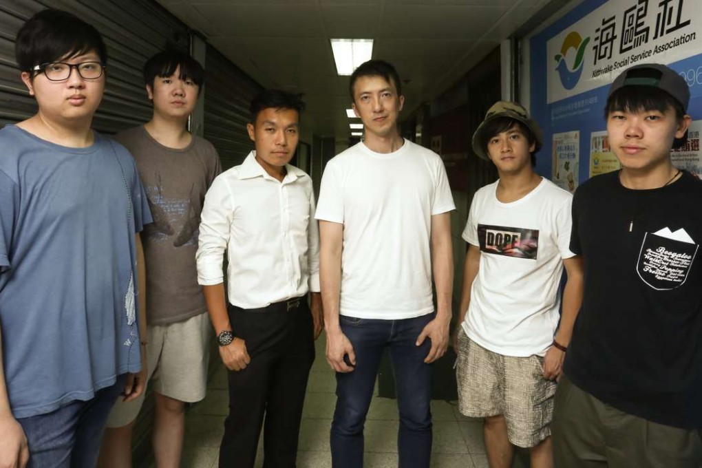 Teen Future director Connor Chu (four from left) with (from left) game testers Cyrus Ng Cheung-yung and Ming Lao Dong Ming; vice-president of Kittiwake Social Service Centre Joseph Yeung Chi-shing; and youth leaders Bulu Tang Wai-nam and Pang Fat. Photo: Jonathan Wong