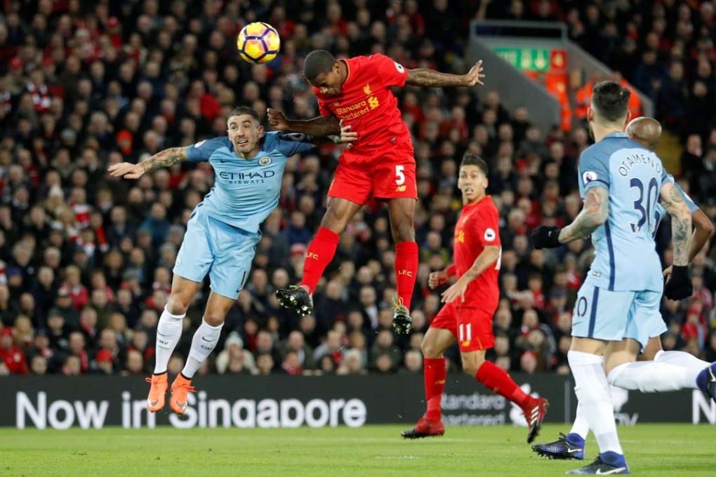 Liverpool's Georginio Wijnaldum scores with his head. Photo: Reuters