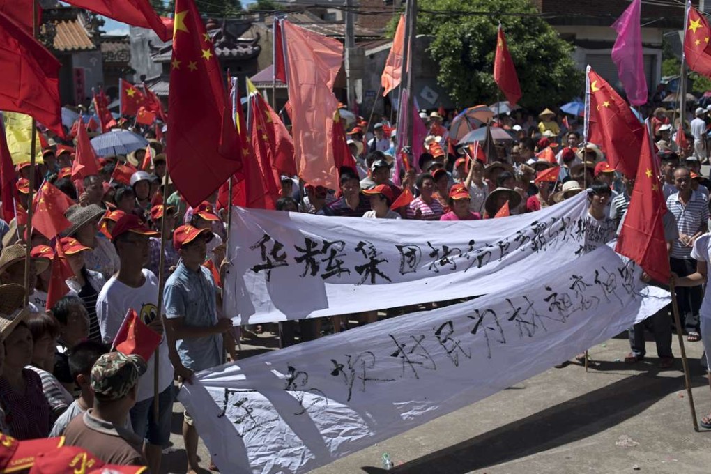 Villagers protest in June in Wukan. Photo: Xiaomei Chen