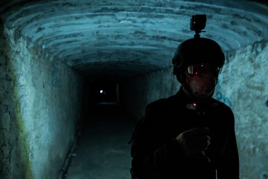 A member of Hong Kong Urban Exploration explores the tunnels under Leighton Hill. Photo: Urbex