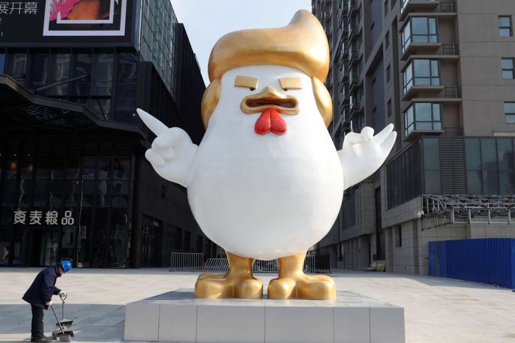 A sculpture of a rooster that local media say resembles to US president-elect Donald Trump stands outside a shopping mall in Taiyuan, Shanxi province. Photo: Reuters
