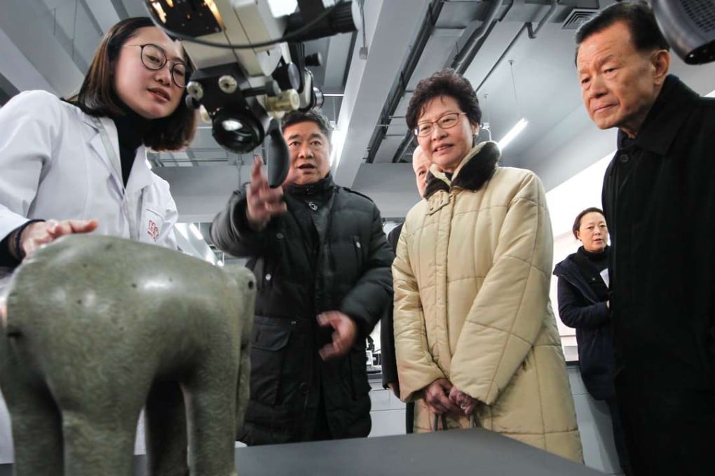 Hong Kong Chief Secretary Carrie Lam Cheng Yuet-ngor (2nd right), visits Palace Museum's Cultural Relics Hospital at the Palace Museum in Beijing. Photo: Simon Song