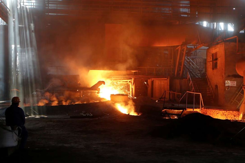 Steel production in Fenyang, Shanxi province. Donald Trump has been accused of stacking his economic team with veterans of US steel interests. Photo: Reuters