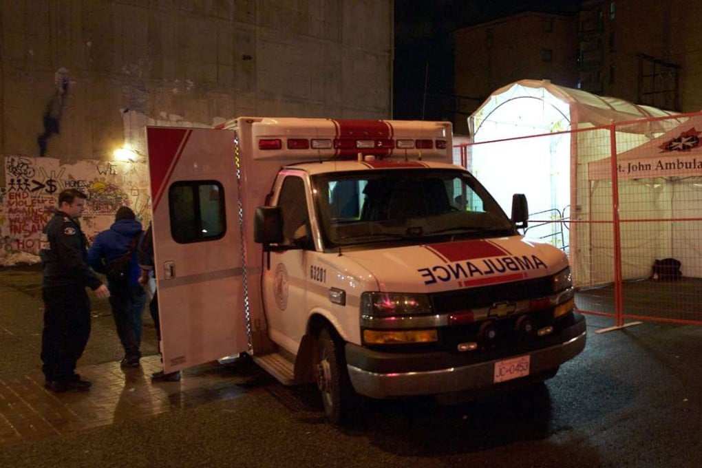 An ambulance delivers a patient to a mobile emergency facility in Vancouver’s Downtown Eastside on December 22. The tent, staffed by emergency and addictions physicians, was set up this month by the government health authority to help tackle the fentanyl crisis that killed 128 people in Canada’s British Columbia in November. Photo: AFP