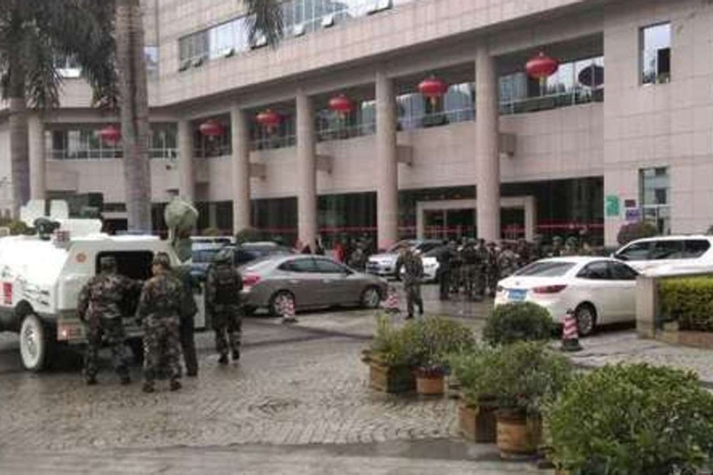 Police attend the scene of a shooting in Panzhihua on Wednesday. Photo: Ifeng News