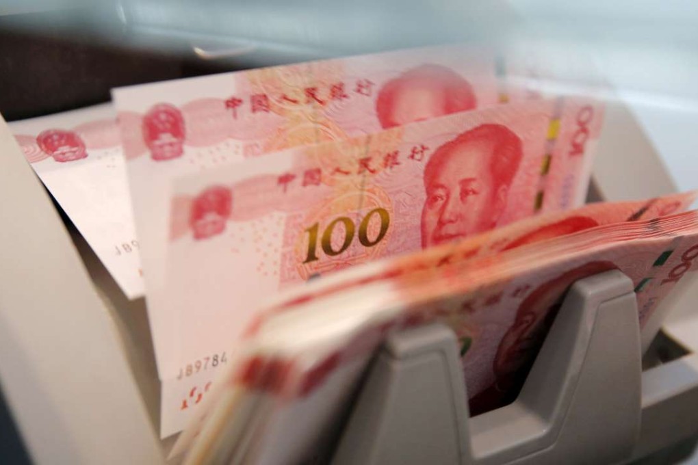The onshore yuan closed at 6.9557 on Tuesday afternoon, the lowest in more than eight years. Photo: Reuters