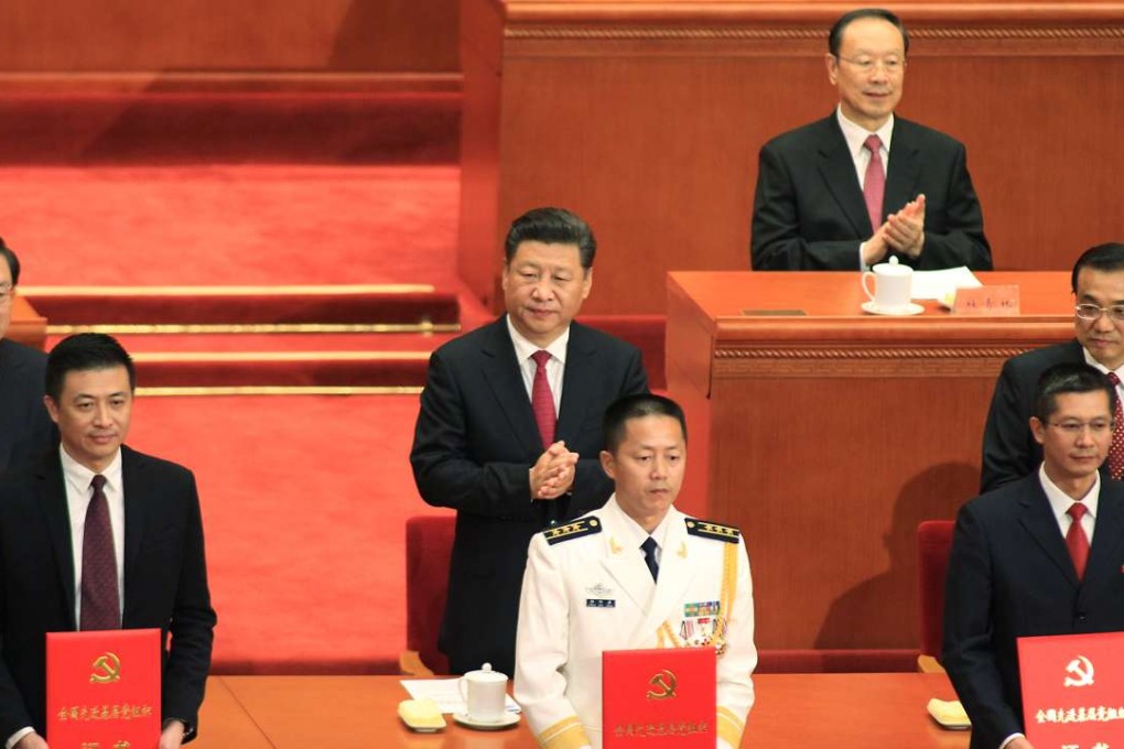 President Xi Jinping (centre) and Premier Li Keqiang (right) will retain their posts after the congress. Photo: Simon Song