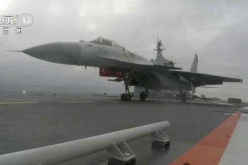 An image from a CCTV video shows a J-15 taking off from the aircraft carrier Liaoning in the South China Sea. Photo: CCTV