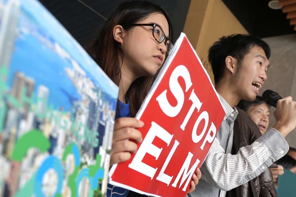 Demonstrators protesting against the planned East Lantau Metropolis (ELM) shout slogans outside a public forum held by the government on “Hong Kong 2030 Plus: Towards a Planning Vision and Strategy Transcending 2030”, at the Chinese University of Hong Kong on December 18. Photo: Paul Yeung