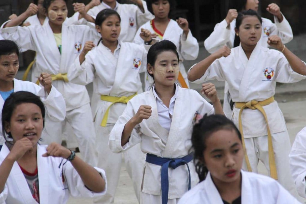 Young girls and women at a refugee camp in Myanmar's Kachin state are studying karate to help protect themselves from a known threat: the country's own military. Photo: AP